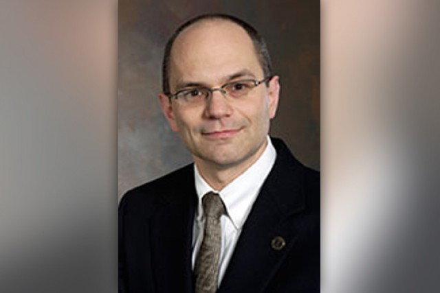 Professor posing for camera