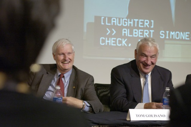 RIT President and Buisnessman speaking at an event