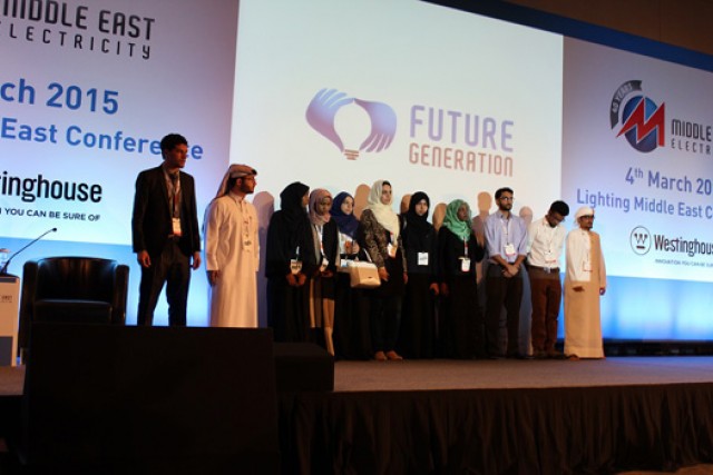 People posing for award at event