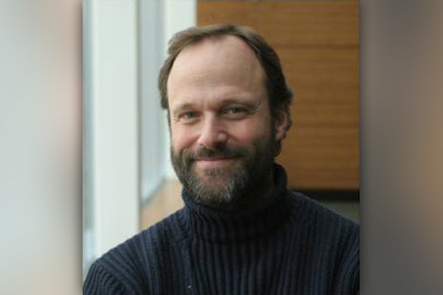 Professor posing for camera