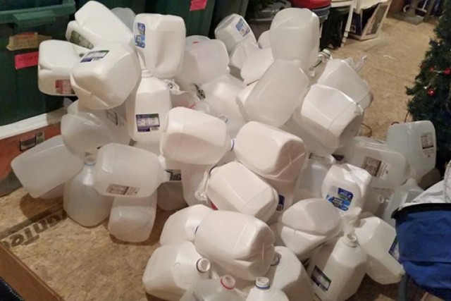 Picture of milk cartoons gathered up