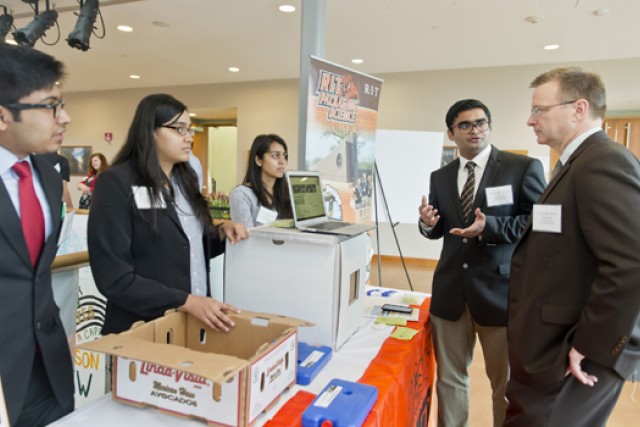 Students showing project to reviewers