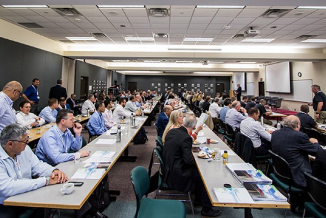 People listening to lecture in classroom