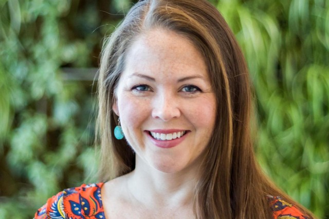 Head-and-shoulders view of woman.