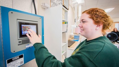 A student working in the Sustainable Building Materials Lab - Environmental Chamber.