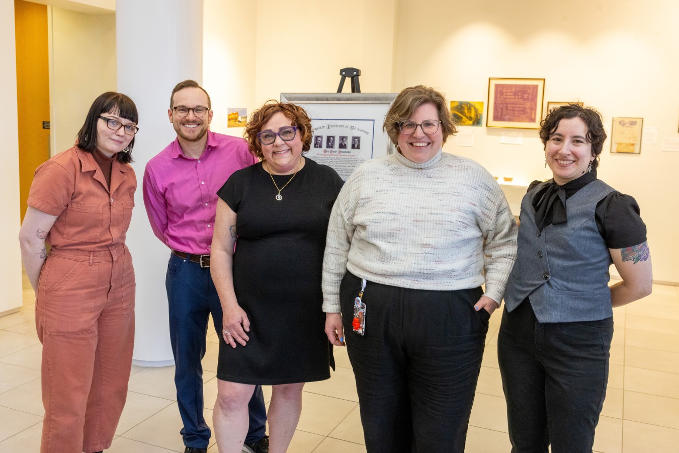 Five people standing together at Staff Awards ceremony