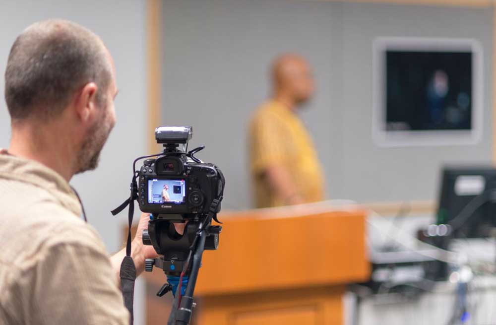 Cameraman recording a lecture