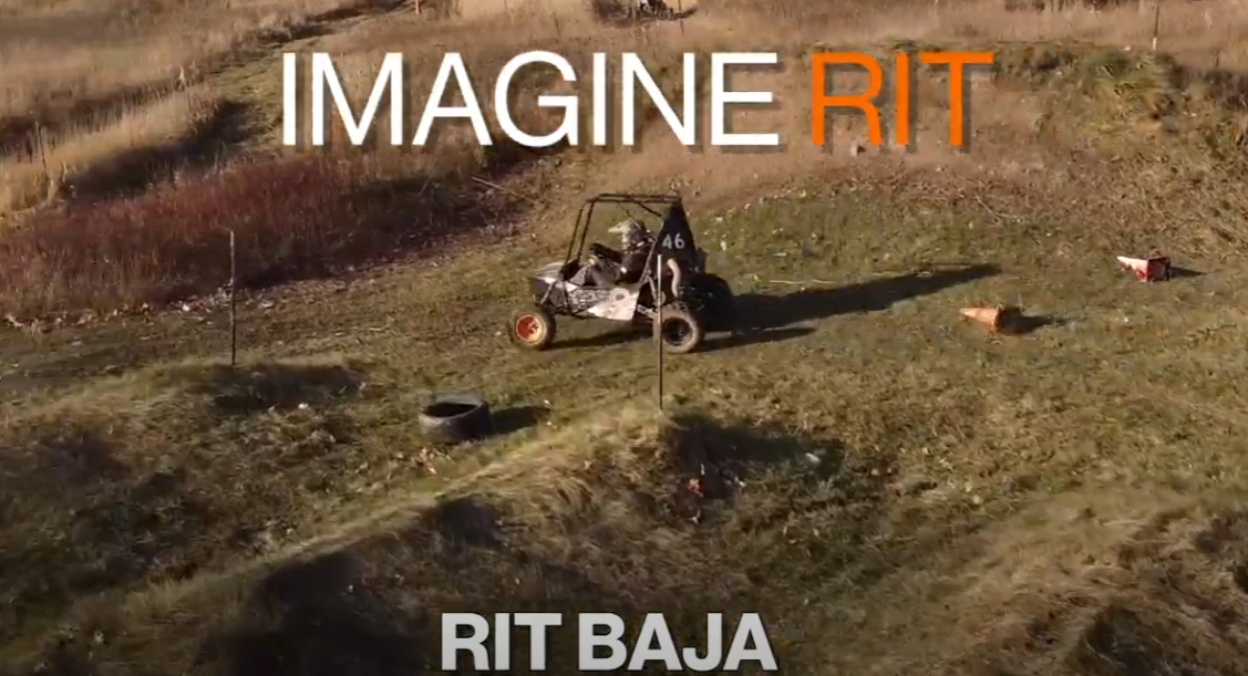 Screenshot of the Baja car outside with the words "Imagine RIT" above the car and "RIT Baja" below the car.