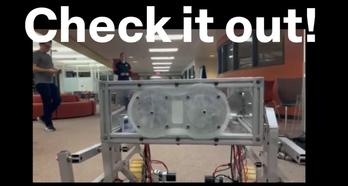 Photo of the rover from behind with the words "check it out!" over the photo.