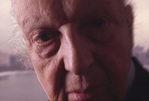 Color photo portrait of musician Leopold Stowkowski. A close up and blurred image of his face with a  clear focus on his right eye.