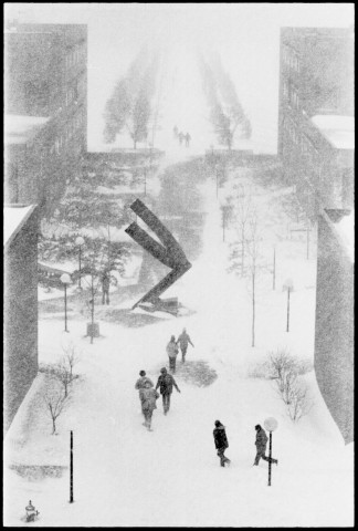 Snowy vista view down a main passage with a large sundial sculpture