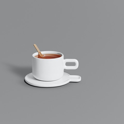 White round cup with handle sitting atop a saucer with a bump out below the handle.