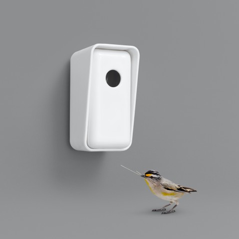 White 3D rectangular box with a round portal fot a bird to enter.