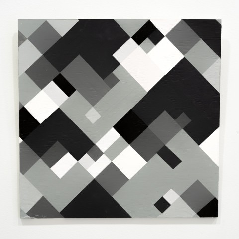a square panel with blocks of black, grey and whites based on a grid design.