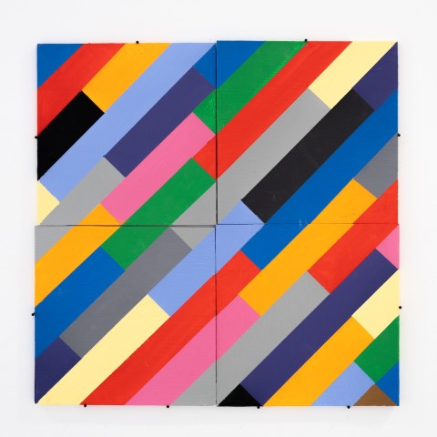 a square panel with blocks of color arranged diagonally based on a grid design.