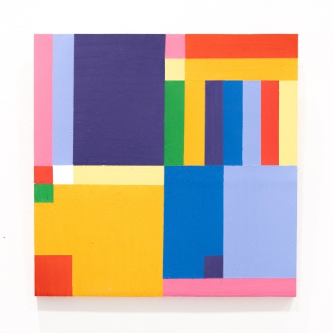 a square panel with blocks of color based on a grid design.