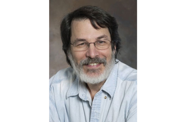 Professor posing for camera