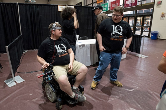 Person demonstrating tech in wheelchairs