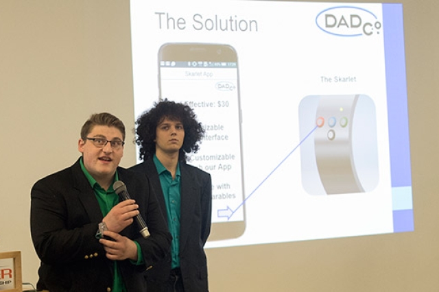 Students pitching business idea at Investor Demo Night