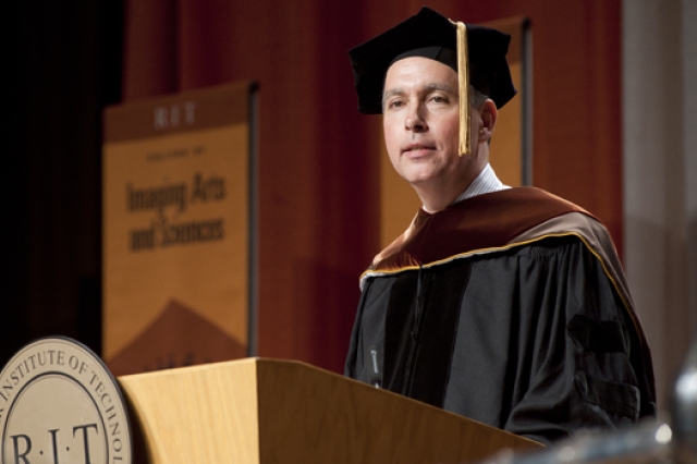 Person giving speech at podium