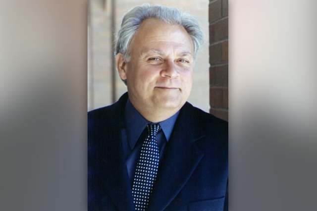 Professor posing for camera