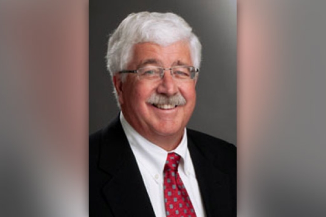 Professor posing for camera