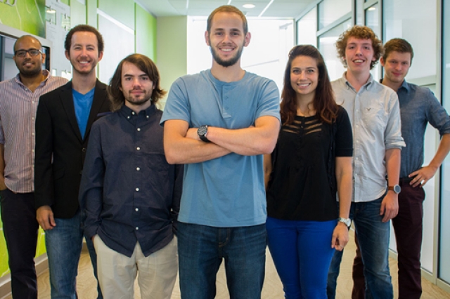 People gathered for picture in hallway