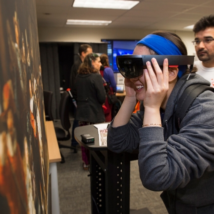 Woman with VR goggles.
