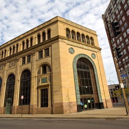 Outside view of old bank in downtown Rochester.