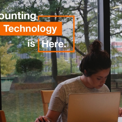A Saunders student enjoys her coffee during a study session. 