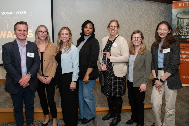 First american Equipment Finance alumni receiving award