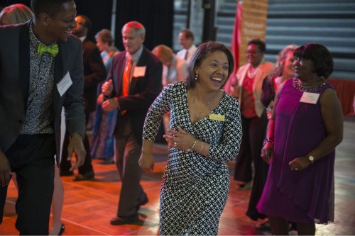 people dancing happily