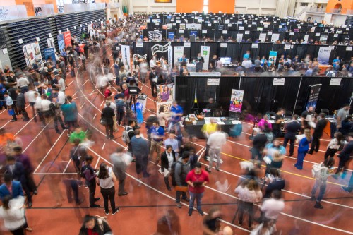 an overhead shot of many people on a track