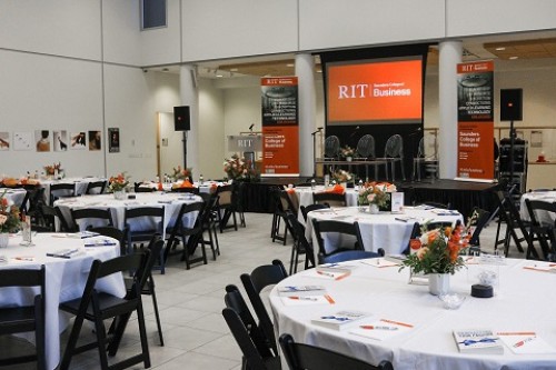tables with chairs and stage