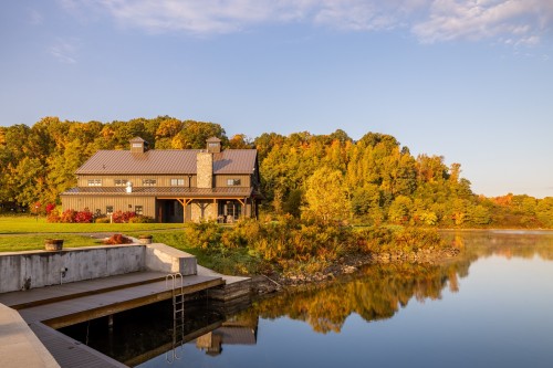 lodge and lake with dock