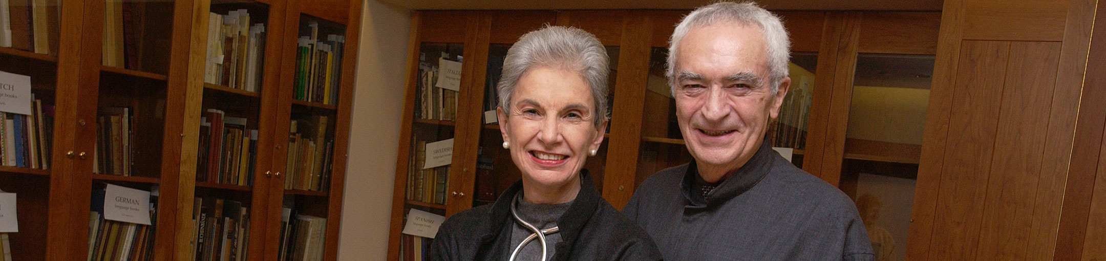 portrait of Massimo and Lella Vignelli in a library