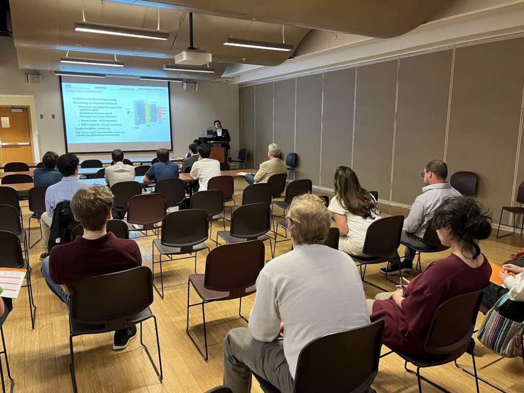 Jake presenting research to an audience at the 2023 RIT Undergraduate Research Symposium.