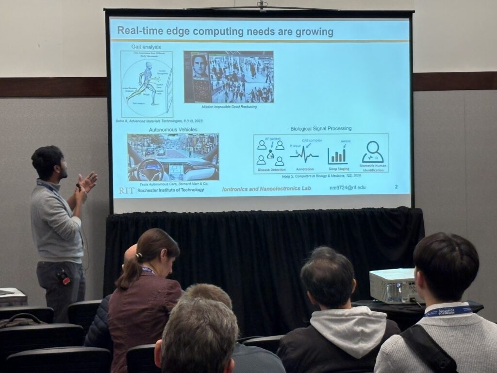 Nithil presenting a research slide about real-time edge computing needs at the 2025 MRS Fall Meeting.
